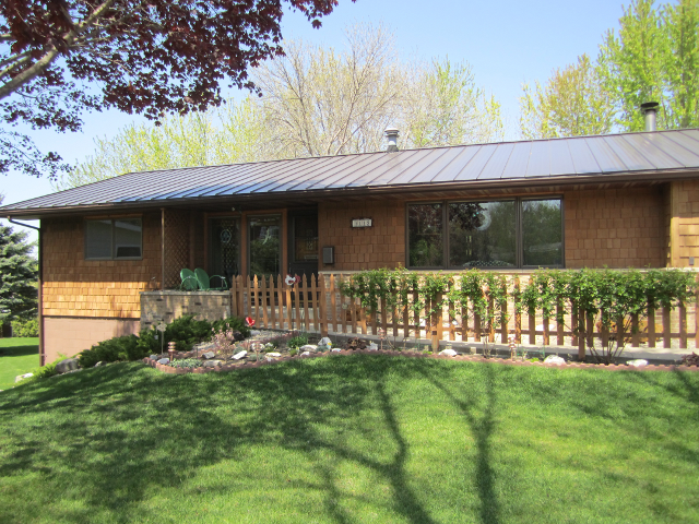 Roofing services and green grass